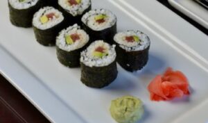sushi roll with meat veggies and fruit